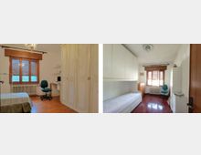 Interno di una camera da letto luminosa con pavimento in legno, armadiature alte a tutta parete, letto e piccola scrivania con sedia. Una grande finestra con persiane in legno e termosifone sottostante illumina l’ambiente.