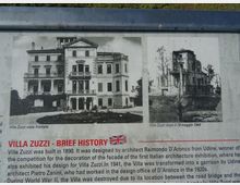 Pannello informativo all’aperto dedicato a “Villa Zuzzi”, con due fotografie storiche in bianco e nero: una vista frontale della villa e un’immagine dell’edificio danneggiato dopo il 19 maggio 1944, accompagnate da testo esplicativo.